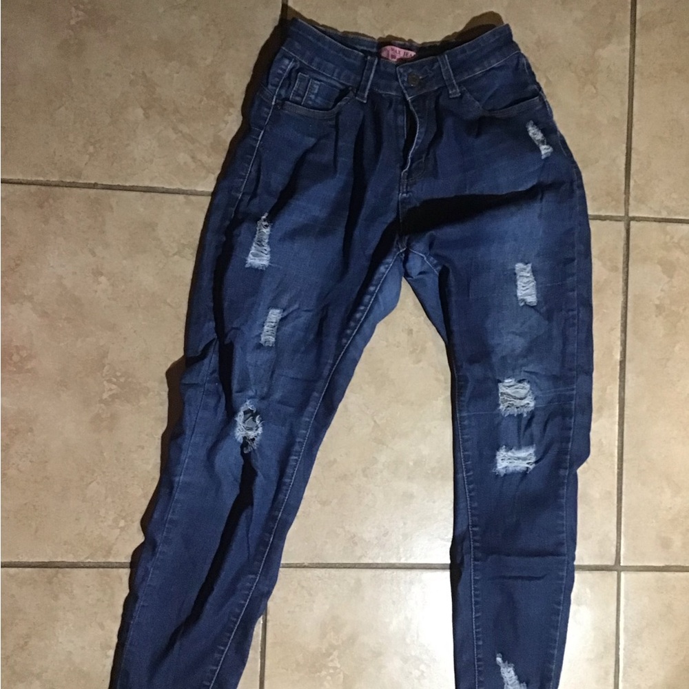 Distressed Blue Denim Jeans